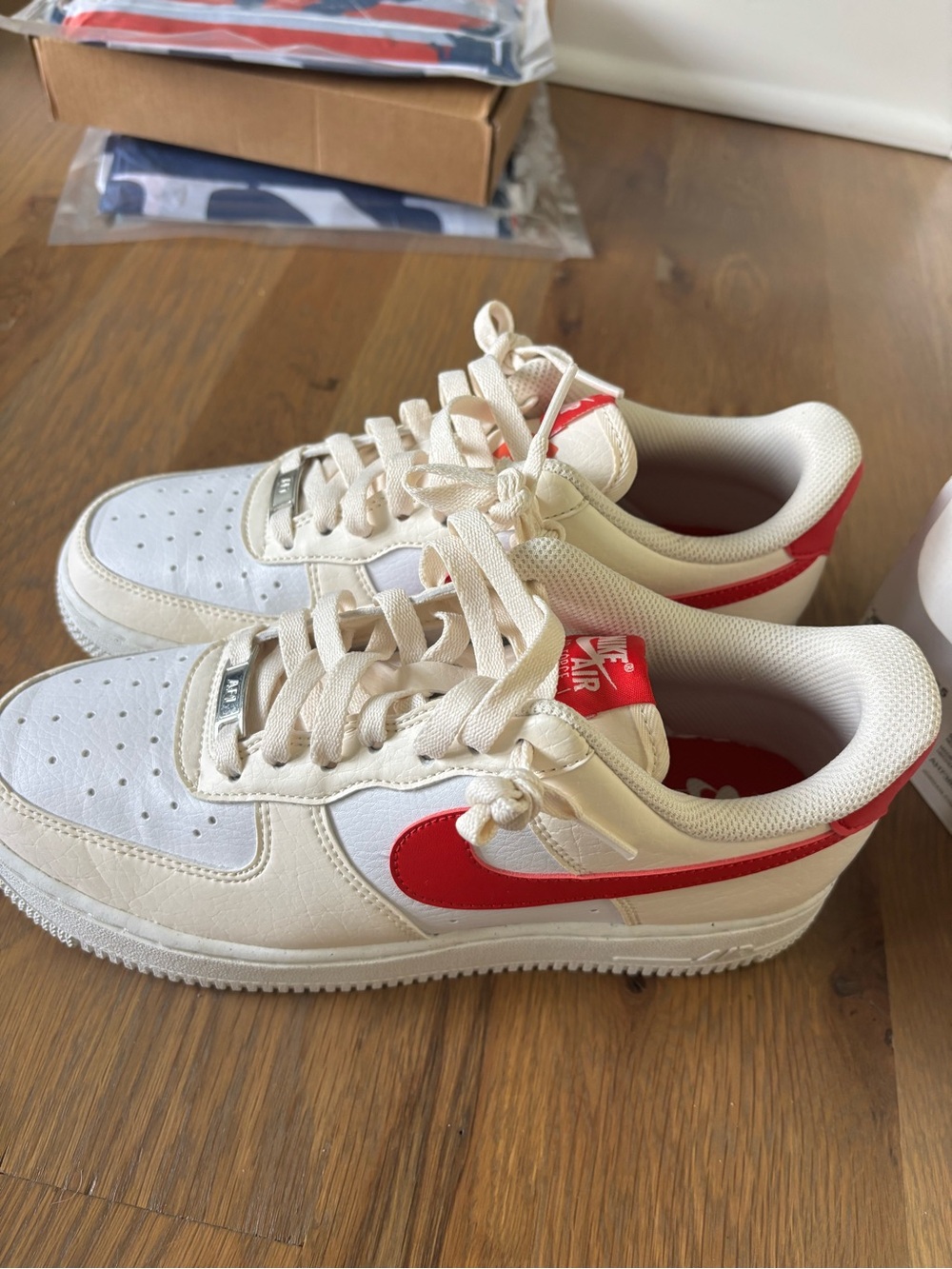Nike Sneakers in White with Red Swoosh